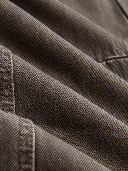 Distressed Denim Curved-Leg Pants